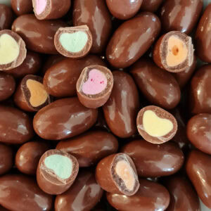 a close up of Clankers (similar to Cadbury Clinkers) with some cut in half.